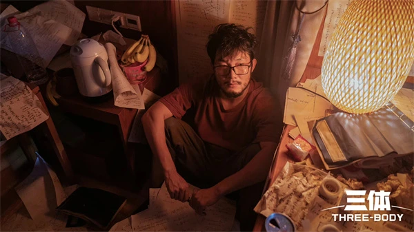 A man trapped in a paper - filled Three - Body labyrinth, drowning in cosmic equations.
