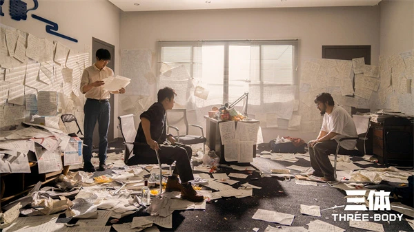 Chaos - filled office becomes a Three - Body portal, papers swirling sci - fi destinies.
