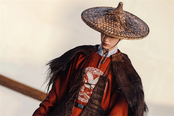 In "Serenade of Peaceful Joy", a figure in red Hanfu and bamboo hat steps out, exuding an air of mystery.