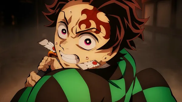 Tanjiro Kamado in a determined, sweat-drenched state in Demon Slayer: Infinity Castle.