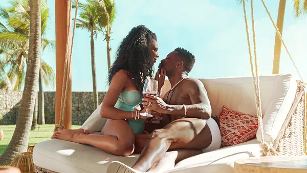 Couple shares a romantic moment outdoors in "Too Hot to Handle: Brazil".