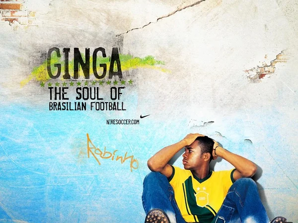 Robinho sits thoughtfully against a wall in "Ginga".